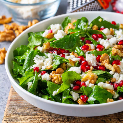 A bowl of salad using arugula rocket leaves.
