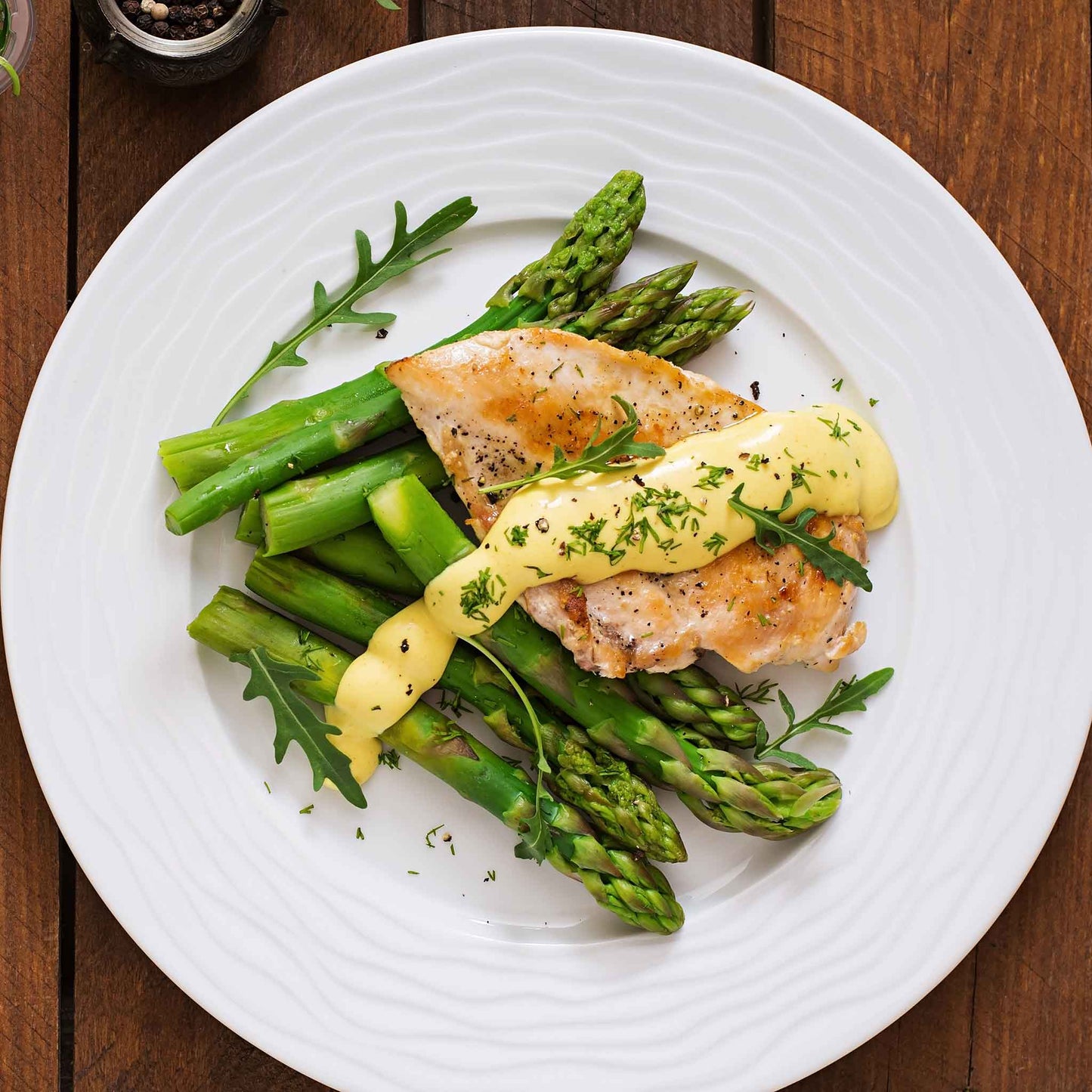A plate of cooked chicket and UC-157 F2 asparagus ready to eat.