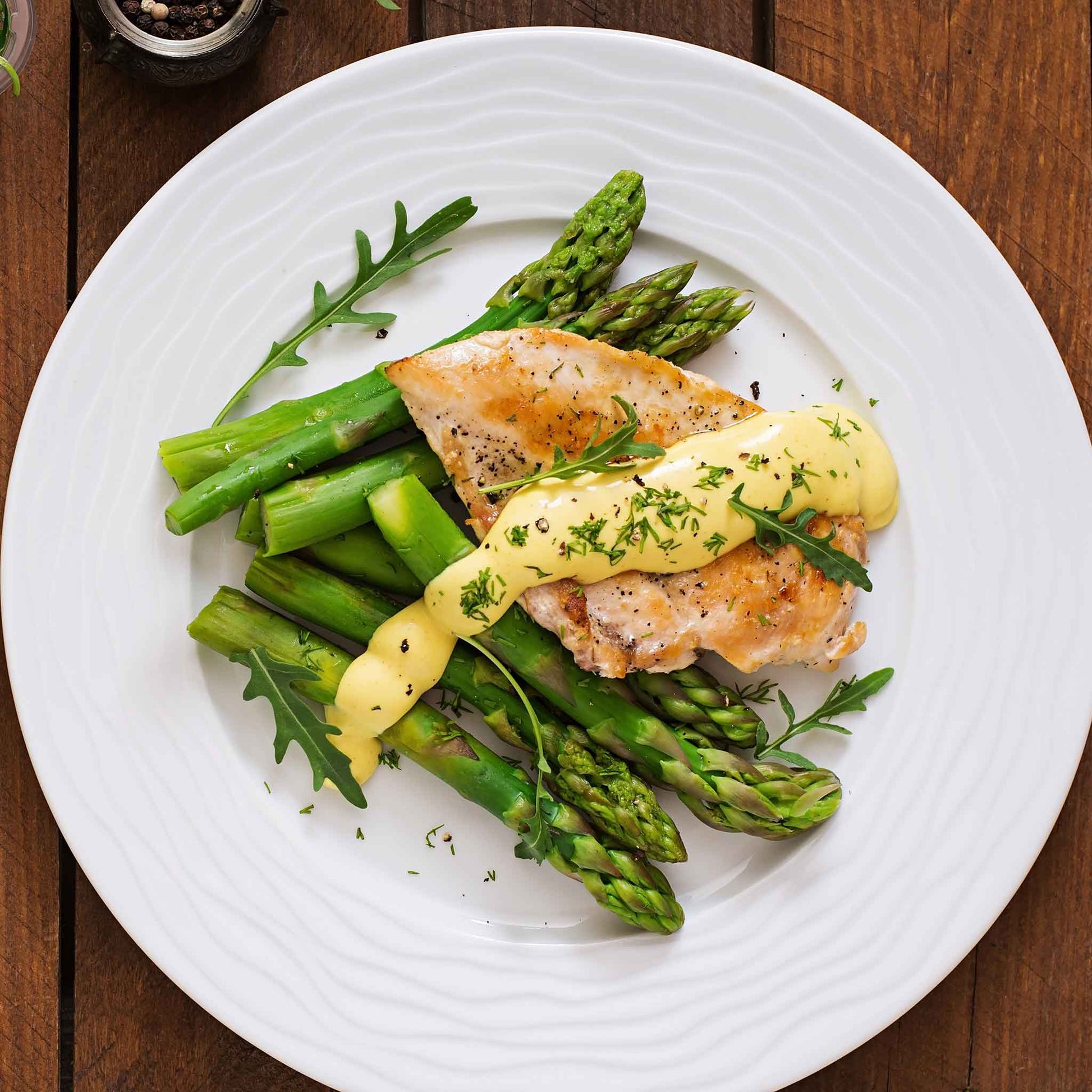 A plate of cooked chicket and UC-157 F2 asparagus ready to eat.