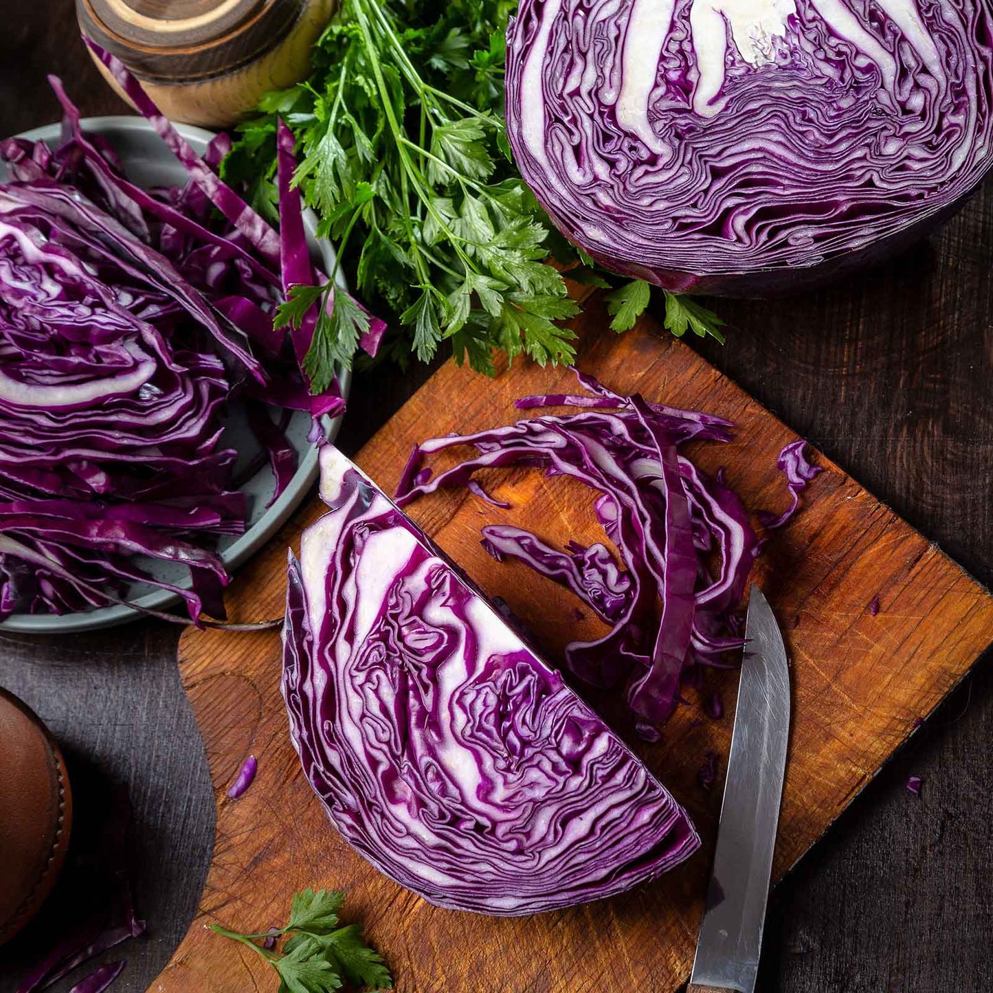 Red Express cabbage sliced and shredded showcasing its vibrant red and white coloring.