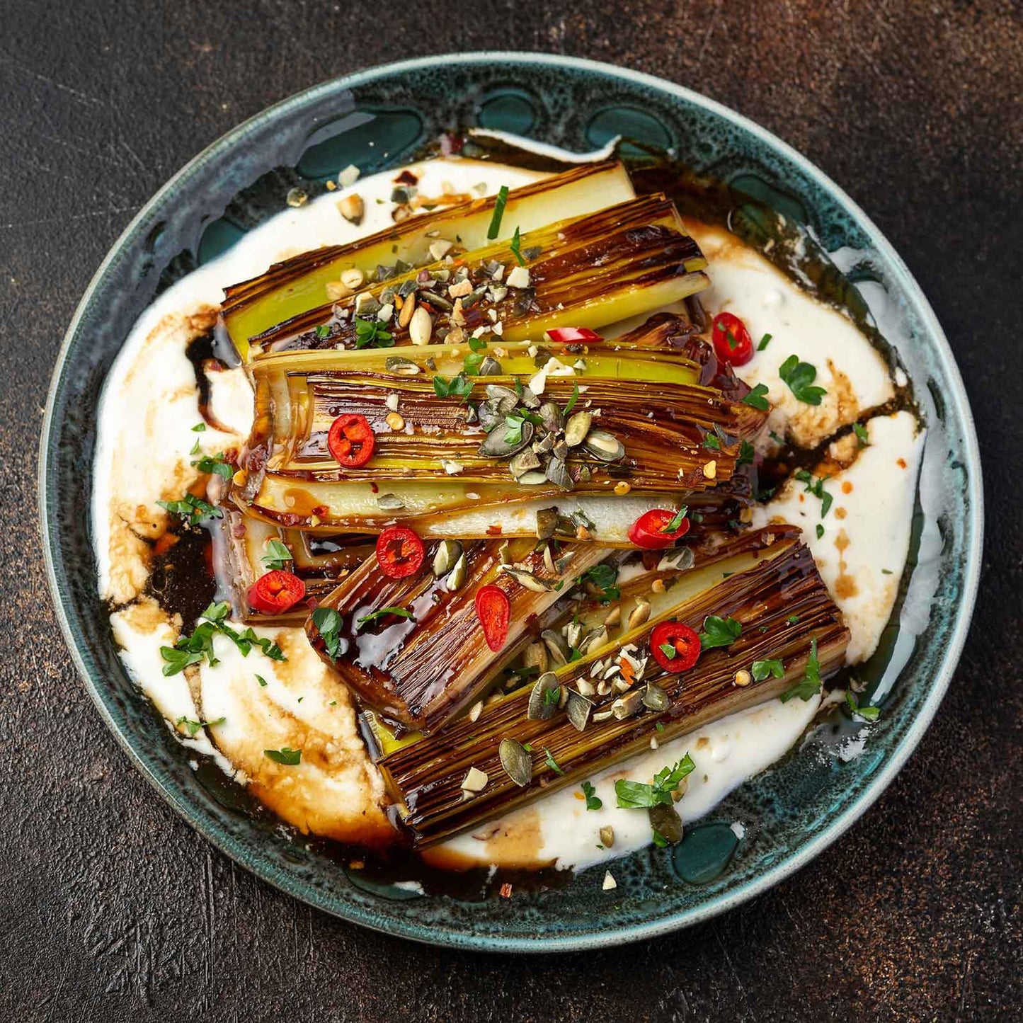 A plate of grilled American Flag leeks ready to eat.