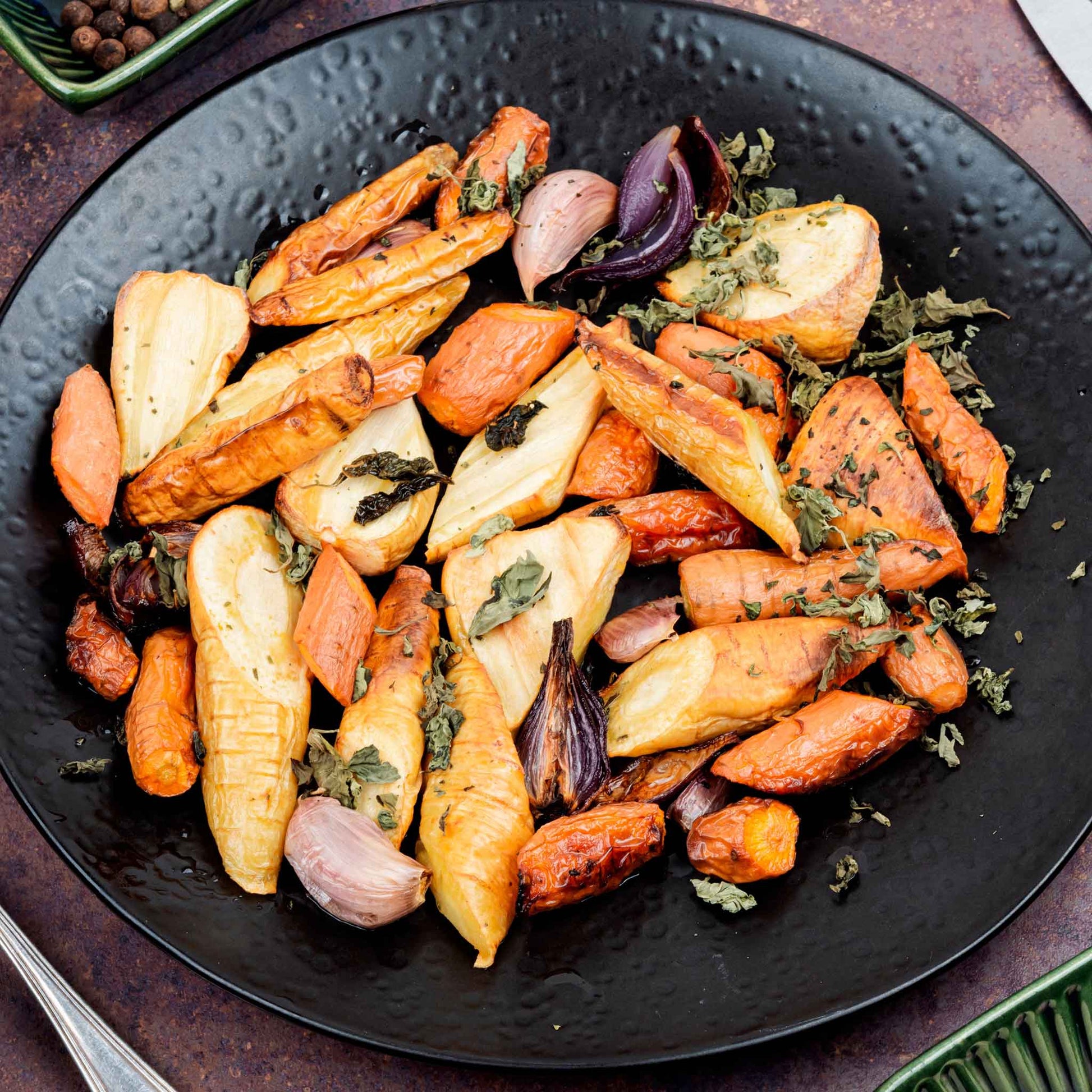 A plate of cut vegetables including All American Parsnips.