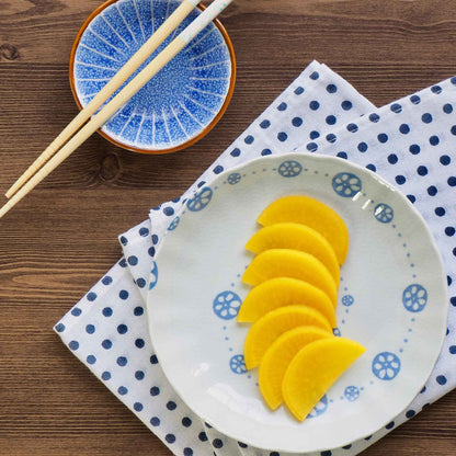Sliced Japanese Minowase Daikon radish on a plate ready for consumption.