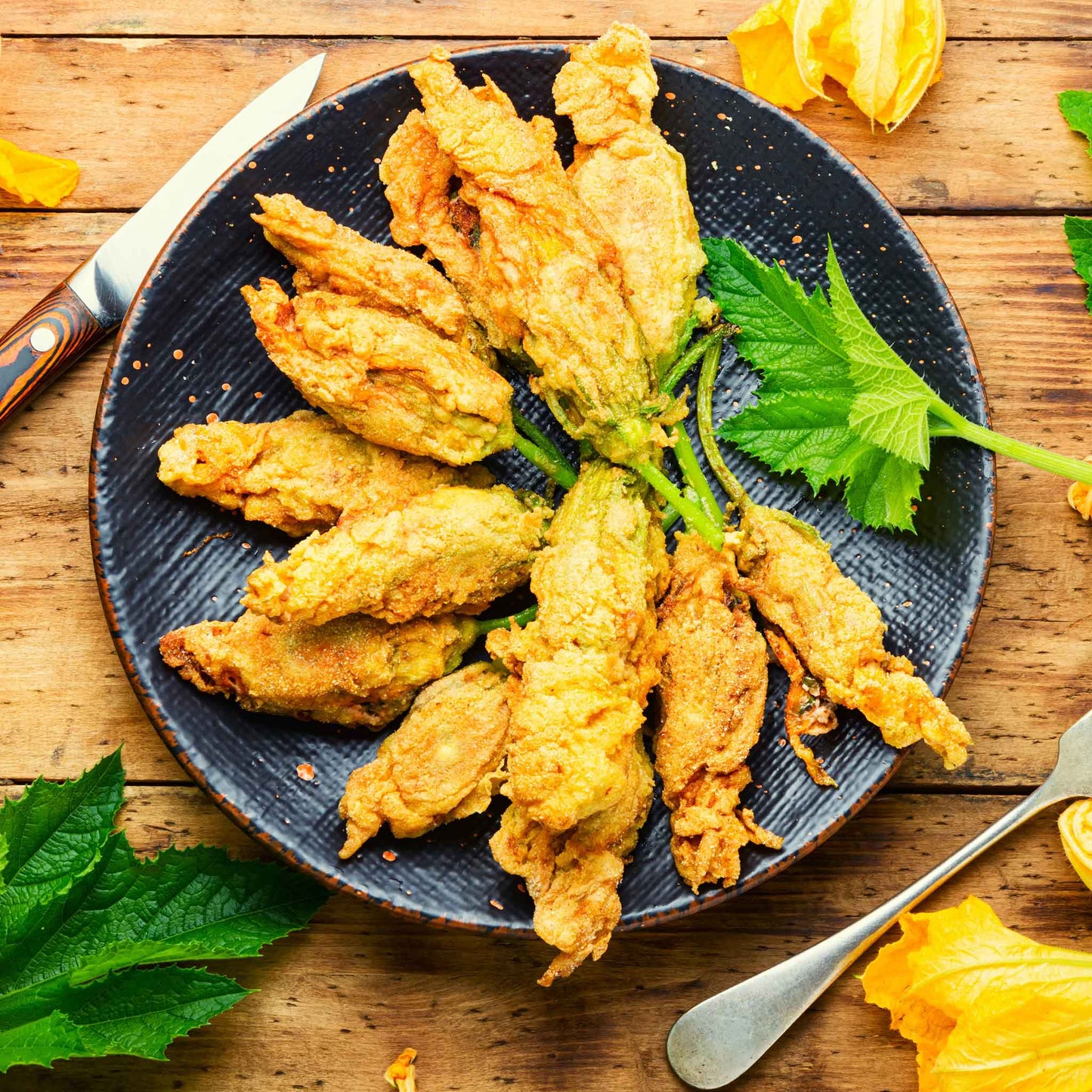A plate of fried Black Beauty Squash ready to eat.